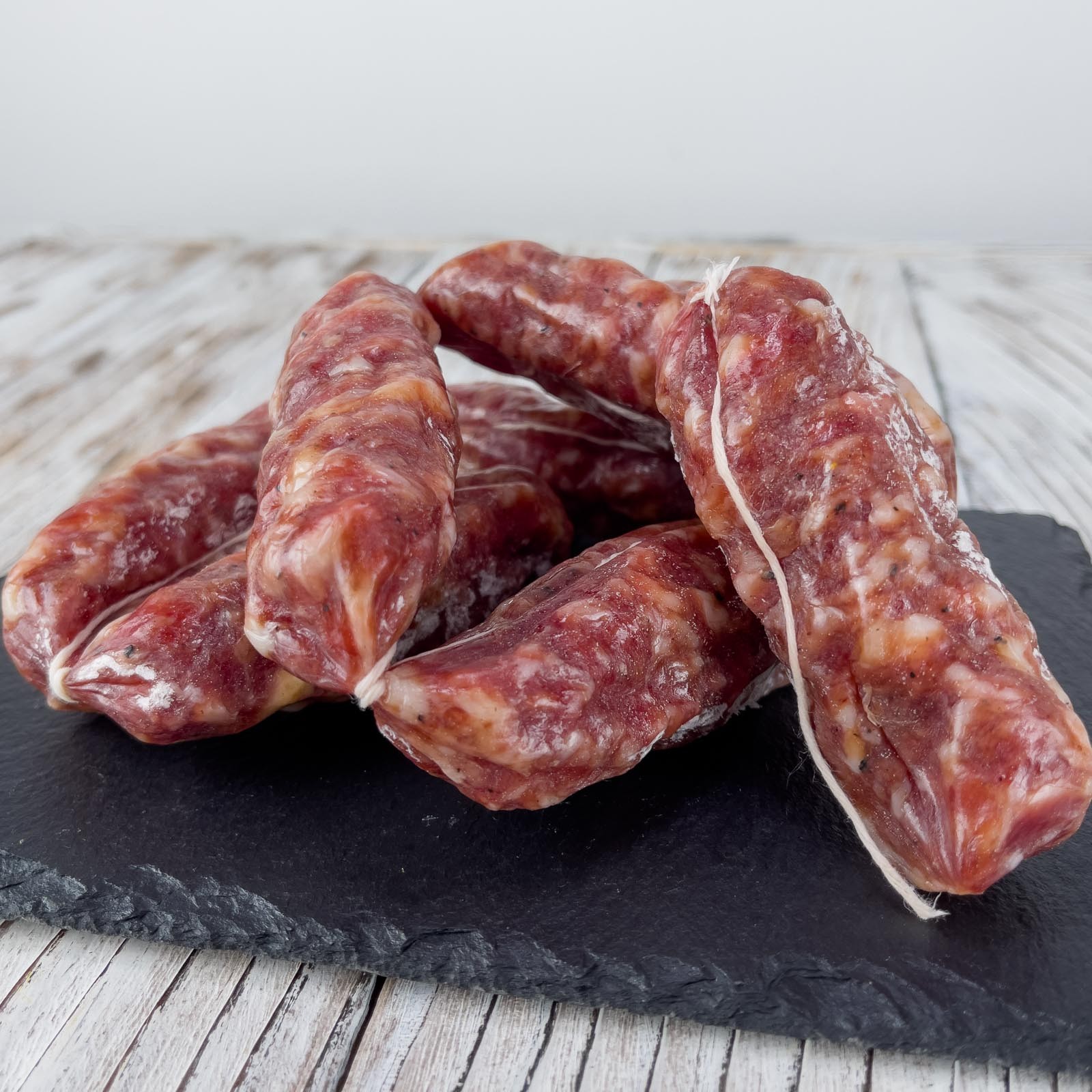 Der Tradition nach gereifter Salsiccia (italienische Wurst) aus erstklassigem Schweinefleisch.