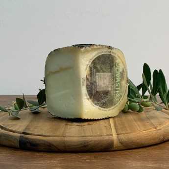 Pecorino Cheese Aged Under Olive Leaves.